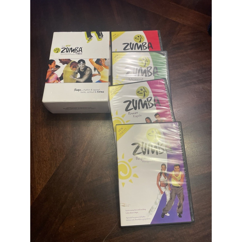 ZUMBA FITNESS 4 Disc DVD Box Set BEGINNERS, ADVANCED, POWER ABS, BUNS